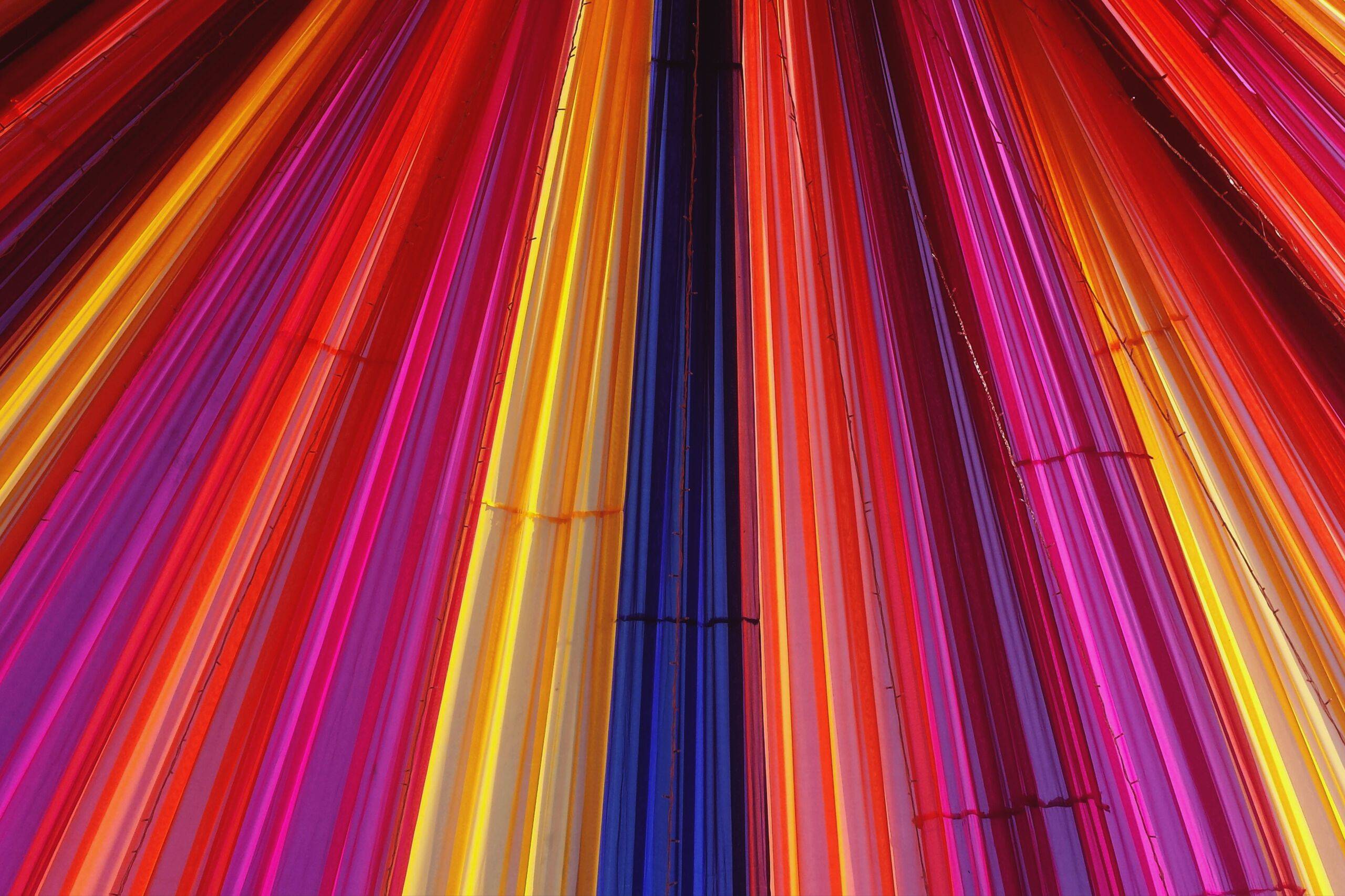 A set of colourful streaks leading up.